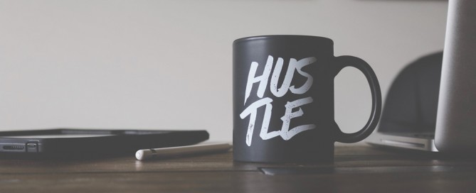 Mug with Hustle written on side